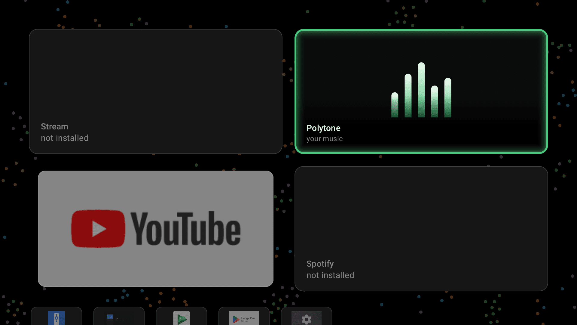 The tvhome launcher on an Android TV: four large tiles, two of them dimmed and labelled not installed, over a particle background.